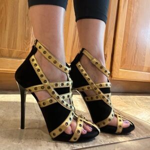 Alexander McQueen Black and Gold Strappy Studded Stiletto Sandals